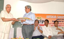 Mr R.K. Roye, Commissioner of Income Tax II, Ludhiana, being felicitated at the opening of a help centre in Ludhiana on Monday