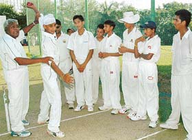 Dronacharya Award winner D.P. Azad hones skills of budding players at an under-15 camp at the PCA grounds, Mohali