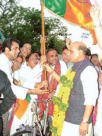 BJP president Rajnath Singh flags off Cycle March against the rising prices of essential commodities on Wednesday in Ludhiana.