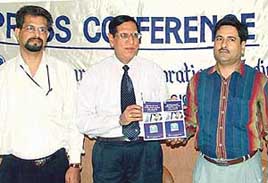 Mr S.C. Dhingra, senior divisional manager, LIC, along with Mr V.K. Dhar, manager, sales, and Mr S.K. Saxena, marketing manager, Ludhiana division, launches LICs Market Plus in Ludhiana on Wednesday.