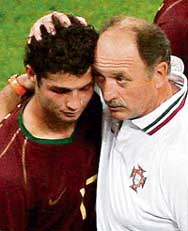 Portugals coach Luiz Felipe Scolari (right) consoles star forward Cristiano Ronaldo after losing to France in Munich on Wednesday. 