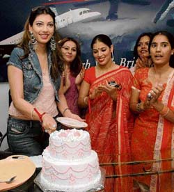 Yukta Mukhi cuts the cake at the British Air Hostess Academy 