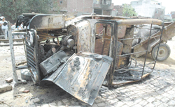 The mangled remains of a jeep which was hit by Samli-Saharanpur Passenger Train in East Delhi