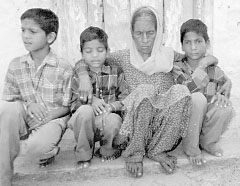 Three orphaned brothers with their grandmother.