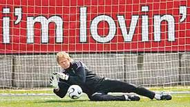 Germanys goalkeeper Oliver Kahn stops a kick during a training session in Berlin on Friday. Kahn will play in the third-place match against Portugal on Saturday. 