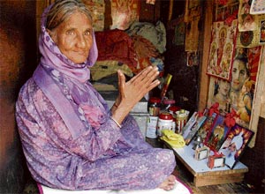 Away from the art studio, Kalawati finds time to turn to the gods who have helped in making her hard existence better