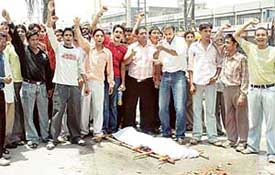 Activists of the Akhil Bhartiya Vidyarthi Parishad burn an effigy of terrorism in Ludhiana on Wednesday. 