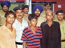 The three accused arrested in connection with the murder of Sri Chand of Mauli Jagran in police custody in Chandigarh on Thursday. 