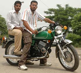 Rajwinder and Dheeraj on the motorcycle designed by them, in Jalandhar.