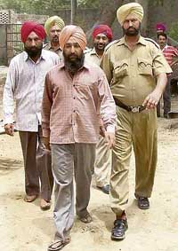 Daljit Singh and Kulwant Singh, both accused in a kidnapping case, being produced in a Bathinda court on Thursday.