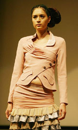 A model exhibits a creation by local designers at the Hong Kong New Fashion Collection Award, 2006, in Hong Kong
