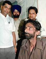 Boatmen and a policeman along with Rajeev Kumar, who allegedly tried to commit suicide by drowning himself in the Sukhna Lake on Friday morning