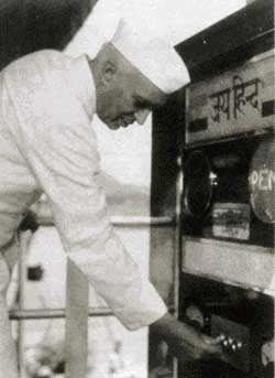 Jawaharlal Nehru switching on the power house of the Bhakra hydro-electric project