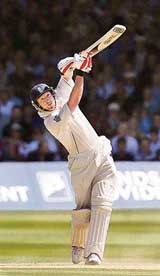 Englands Paul Collingwood hits a four off the bowling of Pakistans Danish Kaneria on the second day of the first Test at Lords on Friday