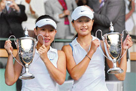Zheng Jie (right) and Yan Zi made history at Wimbledon when they won Chinas first title at the grasscourt Grand Slam event
