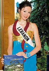 Gabrielle Bou Rached, Miss Lebanon 2006, shows off the gift she brought from her country for the 2006 Miss Universe National Gift Auction benefitting the Glendale Symphony Orchestra in California