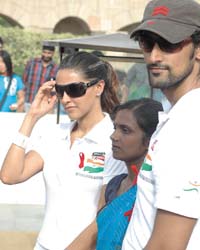 Actors Neha Dhupia and Kunal Kapoor with an HIV patient during the Haath Se Haath Milaa, an HIV/AIDS awareness campaign at Rajghat in the Capital