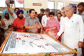 Haryana Chief Minister Bhupinder Singh Hooda inaugurates Bijli Ghar at Sonda village in Ambala on Saturday.