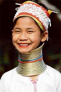 A tribal girl wears neck rings