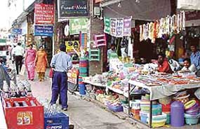 Encroachments by  shopkeepers in Sector 7 market, Panchkula, have  extended up to  the corridors.