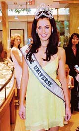 Miss Universe, 2005, Natalie Glebova displays her Mikimoto crown at a store in the South Coast plaza at Costa Mesa