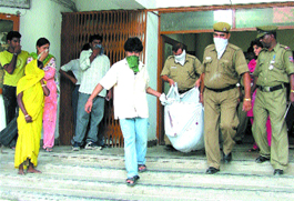 Body of A.J.Anthony, a Section Officer in Army Headquarters, being carried by Delhi Police, in the Capital on Monday.
