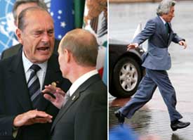 French President Jacques Chirac speaks with Russian President Vladimir Putin (right) as they get ready for a group photo of G8 leaders and guests