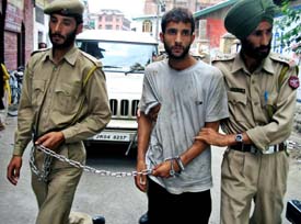 Mohammad Afzal Rather, allegedly involved in the recent grenade blasts in Srinagar, being taken to the court on Tuesday.