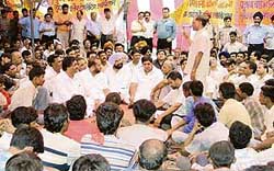 Industrialists stage protest outside the office of the Punjab Pollution Control Board in Ludhiana on Tuesday. 