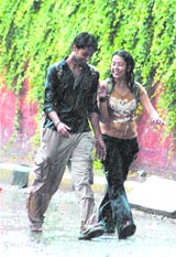 A couple take a saunter in the rain in the Capital on Wednesday