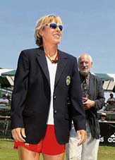 Martina Navratilova (left) receives her International Tennis Hall of Fame jacket from Ken Yellis, museum director of the hall of fame on Tuesday at the Tennis Hall of Fame in Newport.