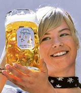 Leonie Stoehr presents the newly designed Oktoberfest beer mug in Munich