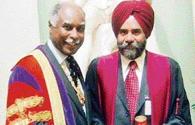 Dr Kuldip Singh with President of the Royal College of Surgeona Bernard Ribiero on being conferred the Fellowship ed eundem, in England.