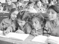Children studying at an anganwadi.