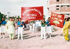 Students of Shishu Niketan School at an environment rally in Mohali on Friday
