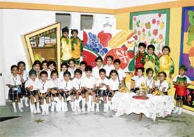 Students of Small Wonders School, Phase VII, during the fruit chaat activity in Mohali on Friday