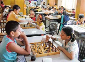 Children concentrate on moves in the two-day chess tournament being organised at the LIC divisional office, Dugri, in Ludhiana