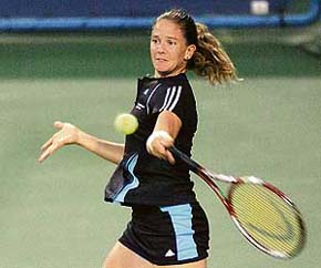 Patty Schnyder of Switzerland returns a shot to Sania Mirza during their quarterfinals match at the Cincinnati Open in Cincinnati, Ohio, USA, on Friday. Schnyder won 7-6, 7-5.