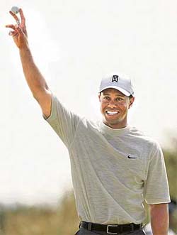 Tiger Woods of the US holds the ball after scoring an eagle on the 14th hole during the second round of the British Open in Hoylake on Friday.