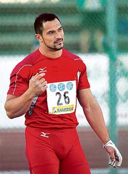 Japans Athens Olympic games gold medalist Koji Murofushi celebrates after winning the mens hammer throw final with a throw of 80.14 m at the Finnish Athletics Championships in Jyvaskyla, central Finland, on Friday.
