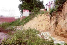 Mr Prem Chand, SDM, Raikot, examines the eroded portion of the bank of Abohar Canal at Sudhar Bridge near Ahmedgarh