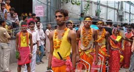 Devotees of Mariamma march in procession with pierced cheeks in Ludhiana on Monday