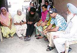 Mrs Bachan Kaur (second from left), mother of Joginder Singh, at Kalsian village near Ahmedgarh.