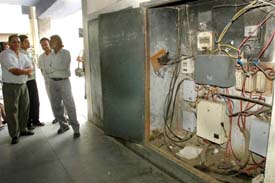 loose electrical wires hang in the open at the Jalandhar District Administrative Complex. 
