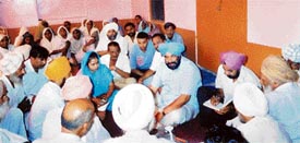Mr Nahar Singh Gill, Mayor, at a public meeting in Mundian Kalan village on Monday