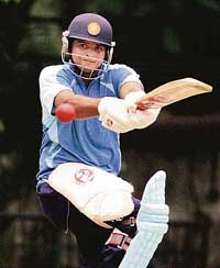Suresh Raina plays a shot during a 10-day training camp at the National Cricket Academy in Bangalore on Tuesday