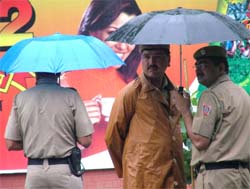 Policemen lounge around at Jantar Mantar near Parliament, where the monsoon session is currently on.