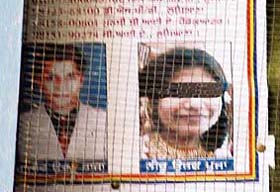 The poster which bears the photo of an innocent girl in place of the most wanted Neeru