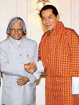 King of Bhutan Jigme Singye Wangchuck shakes hands with President A.P.J. Abdul Kalam at Rashtrapati Bhavan in New Delhi on Wednesday. 