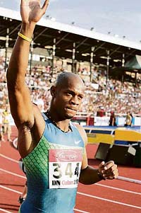 Asafa Powell of Jamaica reacts after winning the 100m final at the IAAF Athletics Super Grand Prix in Stockholm, Sweden